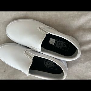 white slip on leather vans
